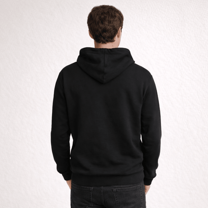 Person wearing a black hoodie from behind on a white background