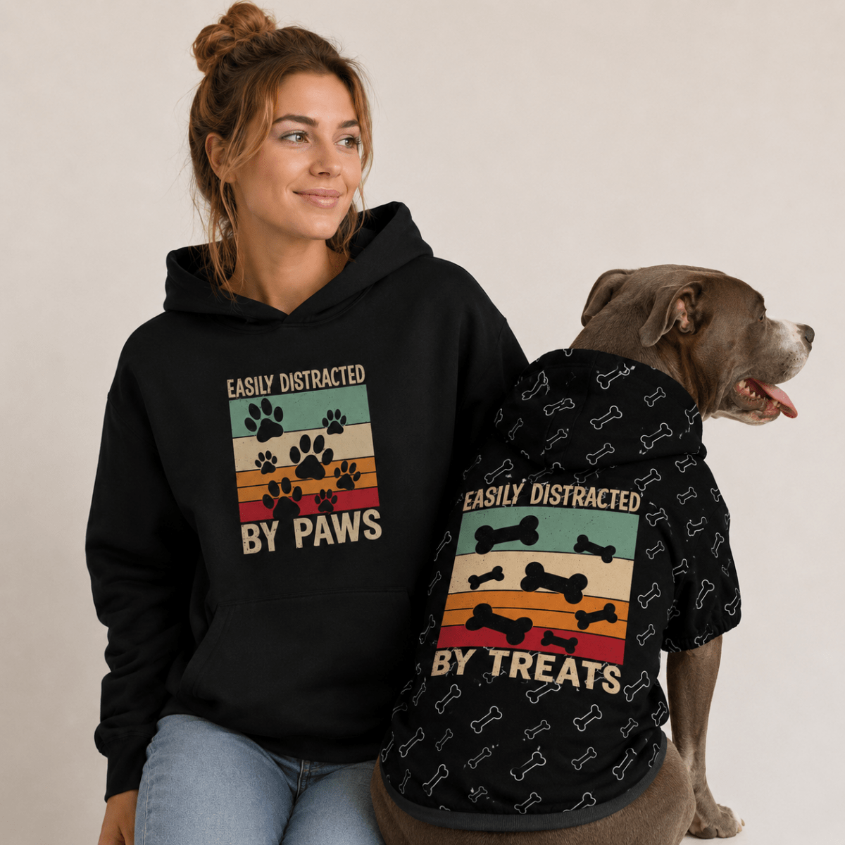 Set shot: "Matching human and dog hoodie set — distracted by paws and distracted by treats"
