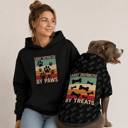 Set shot: "Matching human and dog hoodie set — distracted by paws and distracted by treats"